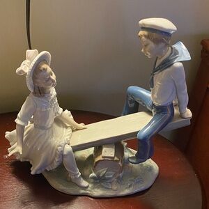 Lladro Porcelain Boy and Girl Seesaw Figurine in White and Blue